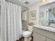 Clean, well-lit bathroom featuring a shower-tub combo, granite vanity, and modern decor at 366 47Th N Ave # 3, St Petersburg, FL 33703