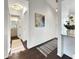 Inviting hallway with warm lighting, stylish rugs, and access to a well-appointed bathroom at 366 47Th N Ave # 3, St Petersburg, FL 33703