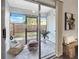 Enclosed sunroom with outdoor views, comfortable seating, and modern decor creating a tranquil retreat at 366 47Th N Ave # 3, St Petersburg, FL 33703