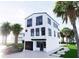 Charming three-story coastal home with modern design and a sleek black car parked in the driveway at 3800 Shore Acres Ne Blvd, St Petersburg, FL 33703