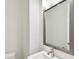 Bathroom featuring quartz countertop vanity, modern fixtures, and large mirror at 448 31St N Ln, St Petersburg, FL 33713