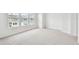 Bright bedroom with large windows offering great light and neutral carpet at 448 31St N Ln, St Petersburg, FL 33713