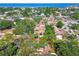 Aerial view of a property marked by a red outline, situated in a residential area near a bay at 4711 W Vasconia St, Tampa, FL 33629