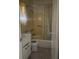 Another view of the bathroom with a shower/tub and a sink at 4711 W Vasconia St, Tampa, FL 33629