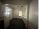 Another view of the kitchen area with an opening to another room at 4711 W Vasconia St, Tampa, FL 33629