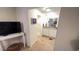 Ensuite bathroom features an updated vanity with granite counters and walk-in shower at 4851 W Gandy Blvd # 23C, Tampa, FL 33611