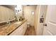 Bathroom with a large vanity and mirror at 4851 W Gandy Blvd # 23C, Tampa, FL 33611