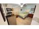 Comfortable bedroom featuring natural light and ceiling fan at 4851 W Gandy Blvd # 23C, Tampa, FL 33611