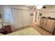 Bedroom with closet and chest of drawers at 4851 W Gandy Blvd # 23C, Tampa, FL 33611