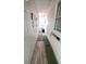 Narrow breezeway with bench seating and exterior access at 4851 W Gandy Blvd # 23C, Tampa, FL 33611