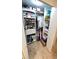 Organized closet with shelving, hanging rods, and storage for clothes and shoes at 4851 W Gandy Blvd # 23C, Tampa, FL 33611
