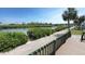 Expansive deck offers picturesque water views, perfect for enjoying waterfront living in a tropical setting at 4851 W Gandy Blvd # 23C, Tampa, FL 33611