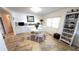 Charming dining area with white table and chairs, built-in storage and natural light at 4851 W Gandy Blvd # 23C, Tampa, FL 33611