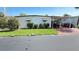 Delightful home featuring a covered parking area, neat landscaping, and a cozy, inviting appeal at 4851 W Gandy Blvd # 23C, Tampa, FL 33611