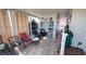 Spacious Florida room with tile flooring and comfortable seating at 4851 W Gandy Blvd # 23C, Tampa, FL 33611