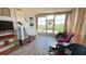 Relaxing Florida room with tile flooring and waterfront views at 4851 W Gandy Blvd # 23C, Tampa, FL 33611