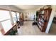 Spacious living room showcasing abundant natural light, wood floors, and a cozy ambiance at 4851 W Gandy Blvd # 23C, Tampa, FL 33611