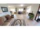 Inviting living room with wood floors, comfortable seating, and a bright, airy atmosphere at 4851 W Gandy Blvd # 23C, Tampa, FL 33611