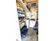 Organized storage room with shelving, washer, and dryer at 4851 W Gandy Blvd # 23C, Tampa, FL 33611