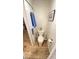 Small toilet with door at 4851 W Gandy Blvd # 23C, Tampa, FL 33611