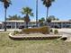 Sunridge Condominiums on Rocky Point Drive, featuring well-maintained landscaping and convenient parking at 5048 Sunridge Palms Dr # 103, Tampa, FL 33617