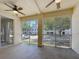 An open patio with lots of natural light and ceiling fans at 5048 Sunridge Palms Dr # 103, Tampa, FL 33617