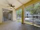 An open patio with lots of natural light and a ceiling fan at 5048 Sunridge Palms Dr # 103, Tampa, FL 33617