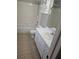 Bright bathroom features a tub and shower combo, white tiled walls, and modern vanity at 5101 Corvette Dr, Tampa, FL 33624