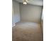 Large bedroom with vaulted ceiling features a ceiling fan and a window for natural light at 5101 Corvette Dr, Tampa, FL 33624