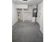 This utility room has the hot water tank, HVAC unit, and some shelving at 5101 Corvette Dr, Tampa, FL 33624