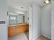 Bathroom with granite countertop on the vanity, a decorative mirror, and tile flooring at 5340 Riva Ridge Dr, Wesley Chapel, FL 33544
