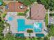 Aerial shot of the stunning community pool with multiple sections for and adults at 5340 Riva Ridge Dr, Wesley Chapel, FL 33544