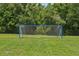 Soccer goal with nets on a green grass community field with lots of trees nearby at 5340 Riva Ridge Dr, Wesley Chapel, FL 33544