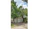 Backyard featuring a shed and ample trees at 5542 19Th N Ave, St Petersburg, FL 33710