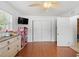Bedroom with wood floors, closet, and a ceiling fan at 5542 19Th N Ave, St Petersburg, FL 33710