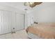 Bedroom with a bed, dresser, and closets for added comfort and storage at 5542 19Th N Ave, St Petersburg, FL 33710
