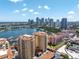Stunning aerial view of waterfront condos with terracotta roofs, a marina, and downtown skyline in the background at 555 5Th Ne Ave # 1032, St Petersburg, FL 33701