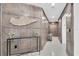 Hallway featuring decorative wall paneling with an angel wing wall sculpture and neutral color scheme at 555 5Th Ne Ave # 1032, St Petersburg, FL 33701