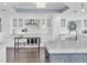 This contemporary kitchen boasts light and bright white cabinetry and countertops and a contrasting island at 555 5Th Ne Ave # 1032, St Petersburg, FL 33701