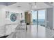 Bright kitchen with stainless steel appliances, white cabinetry, and a large countertop island at 555 5Th Ne Ave # 1032, St Petersburg, FL 33701