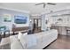 Open concept living room with modern furnishings and an adjacent kitchen is perfect for entertaining at 555 5Th Ne Ave # 1032, St Petersburg, FL 33701