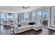 Bright and airy living room with modern furnishings, floor-to-ceiling windows and access to a private balcony at 555 5Th Ne Ave # 1032, St Petersburg, FL 33701