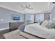 Tranquil primary bedroom with wood floors, sitting area, and ample natural light at 555 5Th Ne Ave # 1032, St Petersburg, FL 33701
