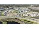 Aerial view of the community showcasing the neighborhood layout, ponds, and surrounding greenery at 5717 Spivey Ct, Wesley Chapel, FL 33545