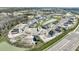 Community aerial view showcasing the new construction, ponds, and surrounding environment at 5717 Spivey Ct, Wesley Chapel, FL 33545