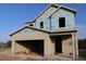 Home under construction showing the framework and design of the future home at 5717 Spivey Ct, Wesley Chapel, FL 33545