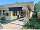 A partial shot of the carport. The house is painted yellow at 5805 Tennessee Ave, New Port Richey, FL 34652