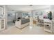 Bright living room with a dedicated workspace, providing comfort and functionality at 6149 37Th N Ave, St Petersburg, FL 33710