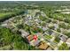 High aerial view of the neighborhood with a lake and community buildings at 6232 Crickethollow Dr, Riverview, FL 33578