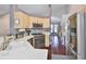 Kitchen with stainless steel appliances, light wood cabinets, and a view to the dining area at 6232 Crickethollow Dr, Riverview, FL 33578